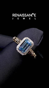 Yellow gold Fancy Blue Emerald Cut Diamond Halo Ring with Filigree Band and Prong Setting