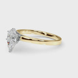 Yellow gold Pear Solitaire Diamond Engagement Ring with Four-Prong Setting on a Classic Band