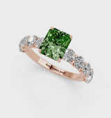 Rose gold Fancy Green Radiant Cut Diamond Prong Setting with Side Stones on a Pave Band