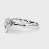 Platinum Pear Solitaire Diamond Engagement Ring with Four-Prong Setting on a Classic Band