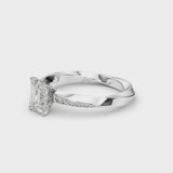 Platinum Emerald Cut Diamond Engagement Ring with Side Stone Accents and Four-Prong Setting