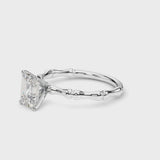 Silver Emerald Solitaire Diamond Ring with Bamboo Band and Four-Prong Setting