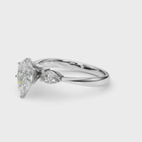 White gold Three-Stone Pear Cut Diamond Ring with Pear Side Stones and Four-Prong Setting