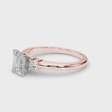 Rose gold Three-Stone Emerald Cut Diamond Solitaire with Prong Setting and Classic Band