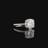 Yellow gold Radiant Brilliant Solitaire with Pavé Band and Claw Prong Setting