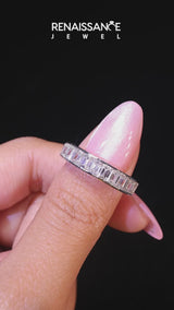 Platinum emerald cut diamond eternity band with channel set