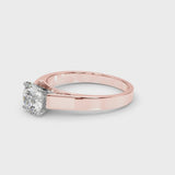 Rose gold Round Solitaire Engagement Ring with Four-Prong Setting and Tapered Band