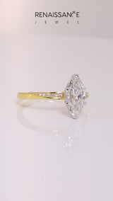 Yellow gold Marquise Cut Diamond Engagement Ring with Side Stone Accents and Four-Prong Setting