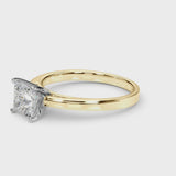 Yellow gold Oval Solitaire Diamond Ring with Four-Prong Setting and Classic Band