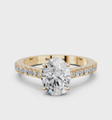 Yellow gold Oval Cut Solitaire Diamond Engagement Ring with Pave Band and Four-Prong Setting