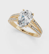 Yellow gold Pear Cut Diamond Solitaire Engagement Ring with Split Shank Pavé Band