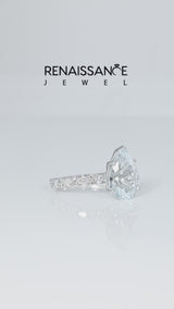 Silver Pear Cut Aquamarine Side Stone Solitaire Ring with Round  and Four-Prong Setting