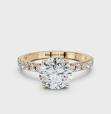 Yellow gold Round Cut Diamond Solitaire Pavé Band with Four-Prong Setting
