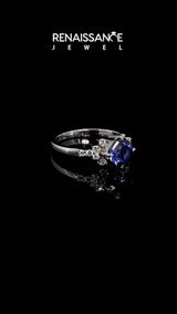 Silver Cushion Cut Tanzanite Ring with Side Stones and Four-Prong Setting