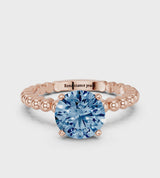 Rose gold Fancy Blue Round Cut Diamond Solitaire Ring with Beaded Band and Prong Setting