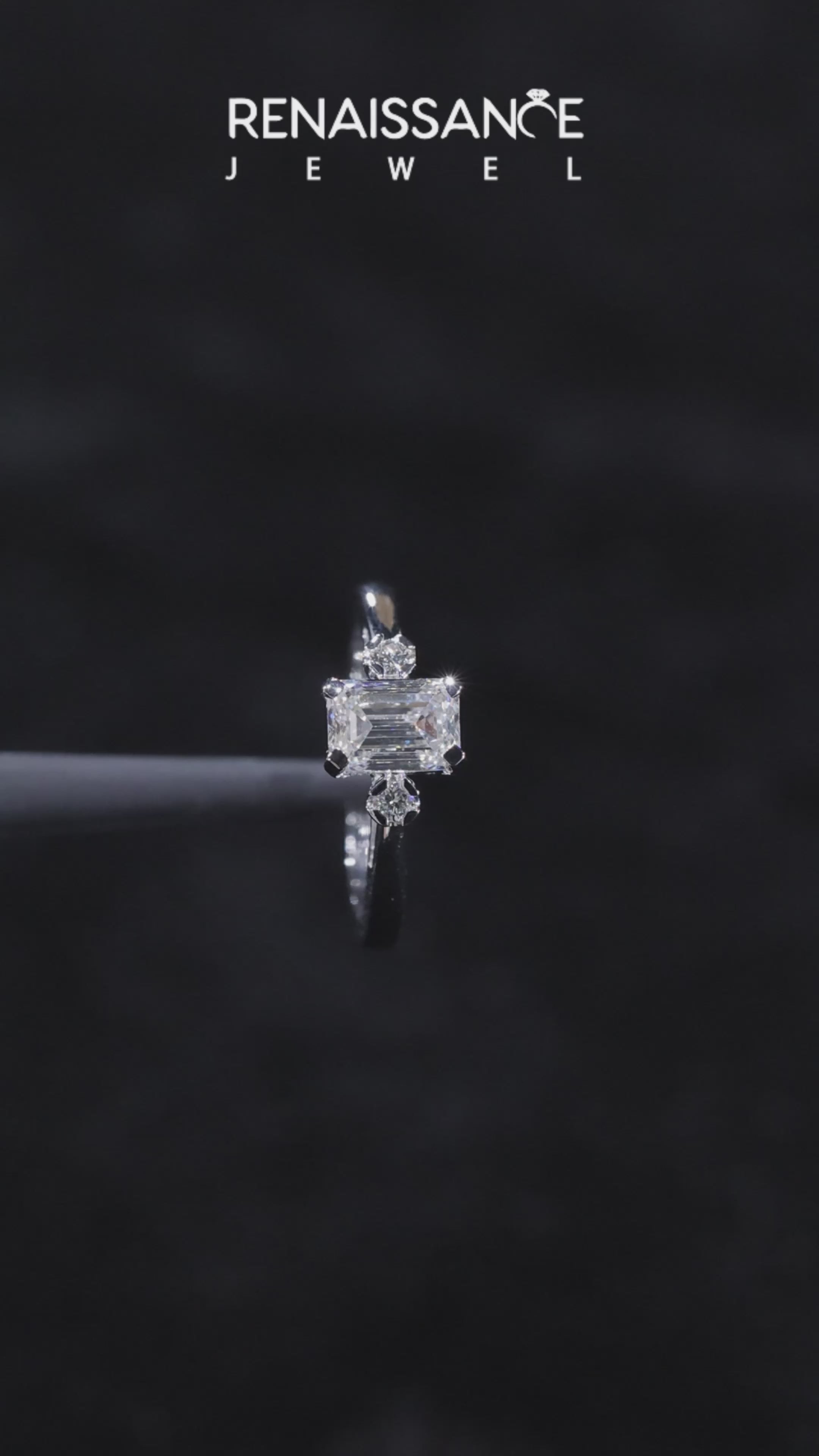 Silver Emerald Cut Three-Stone Solitaire Ring with Round Accent Diamonds and Four-Prong Setting 5