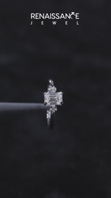 White gold Pear Cut Three-Stone Solitaire Ring with Round Accent Diamonds and Four-Prong Setting