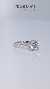 White gold Round Cut Diamond Solitaire Ring with Round  Pavé Band and Four-Prong Setting