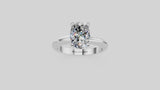 Platinum Oval Cut Diamond Solitaire Engagement Ring with Round Band and Four-Prong Setting