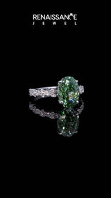 Silver Fancy Green Oval Cut Diamond Side Stone Solitaire Ring with Round  and Four-Prong Setting