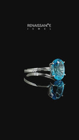 Silver Oval Cut Blue Topaz Solitaire Engagement Ring with Classic Band and Four-Prong Setting