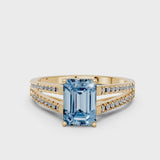 Yellow gold Fancy Blue Emerald Cut Diamond Solitaire Engagement Ring with Split Shank Pavé Band