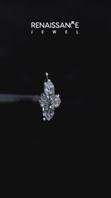 Platinum Three-Stone Oval Cut Diamond Ring with Pear Side Stones and Four-Prong Setting