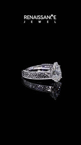 White gold Pear Cut Diamond Solitaire Ring with Engraved Band and Four-Prong Setting