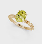 Yellow gold Fancy Yellow Oval Cut Diamond Solitaire Ring with Beaded Band and Prong Setting