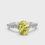 Silver Fancy Yellow Oval Cut Solitaire Diamond Ring with Pave Band and Four-Prong Setting