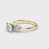 Yellow gold Three-Stone Heart Cut Diamond Ring with Pear Side Stones and Four-Prong Setting