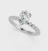 Platinum Pear Cut Diamond Solitaire Ring with Beaded Band and Prong Setting