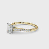 Yellow gold Radiant Cut Solitaire Diamond Ring with Pave Band and Four-Prong Setting