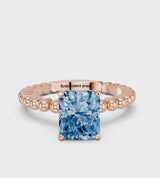 Rose gold Fancy Blue Radiant Cut Diamond Solitaire Ring with Beaded Band and Prong Setting