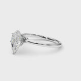 Silver Pear Cut Diamond Solitaire Engagement Ring with Classic Band and Four-Prong Setting