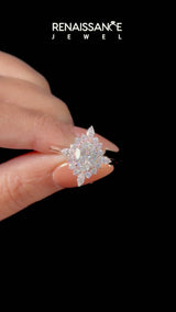Rose gold Oval Halo Diamond Cluster Ring with Marquise and Round Stones on a White Gold Band with Prong Setting