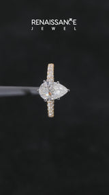 Yellow gold Pear Cut Diamond Cathedral Solitaire Ring with Round  Pavé Band