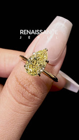 Yellow gold Fancy Yellow Pear Cut Diamond Solitaire Engagement Ring with Classic Band and Four-Prong Setting