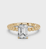 Yellow gold Emerald Cut Diamond Solitaire Ring with Beaded Band and Prong Setting