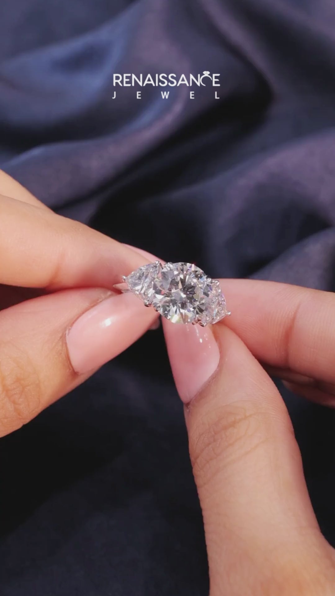 Silver Three-Stone Round Diamond Ring with Pear Side Stones on a Platinum Band with Four-Prong Setting 5