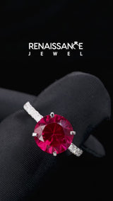 Silver Round Cut Ruby Solitaire Ring with Round  Pavé Band and Four-Prong Setting