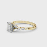 Yellow gold Emerald Cut Diamond Solitaire Ring with Side Stones and Four-Prong Setting