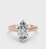 Rose gold Marquise Cut Diamond Solitaire Engagement Ring with Cathedral Setting and Four-Prong Mount