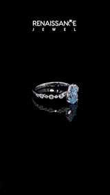 Platinum Fancy Blue Pear Cut Diamond Prong Set Engagement Ring with Pavé Band
