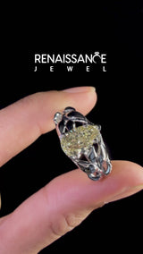 Platinum Fancy Yellow Pear Cut Diamond Leaf-Inspired Engagement Ring with Round Accents and Prong Setting