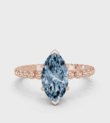 Rose gold Fancy Blue Marquise Cut Diamond Solitaire Ring with Beaded Band and Prong Setting