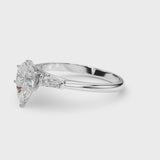Silver Pear Solitaire with Tapered Baguette Side Stones on a Classic Band with Six-Prong Setting