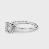 Platinum Cushion Cut Diamond Solitaire Engagement Ring with Classic Band and Four-Prong Setting