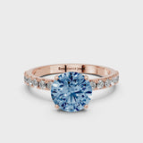Rose gold Fancy Blue Round Cut Diamond Solitaire Pavé Band with Four-Prong Setting