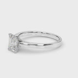 Silver Emerald Solitaire Diamond Ring with Four-Prong Setting and Classic Band